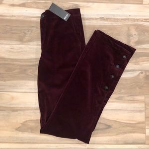 Never worn. High waisted. Corduroy. Button detail.